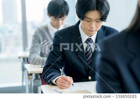 Students taking exams Students taking exams 138850283