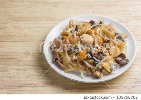 Chinese rice dish in the style of Eight Treasure Stir-fry Chinese rice dish in the style of Eight Treasure Stir-fry 138850762
