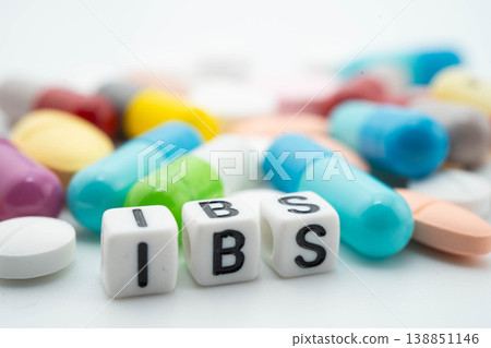 IBS Irritable bowel syndrome word with pills and capsules medical drug. IBS Irritable bowel syndrome word with pills and capsules medical drug. 138851146