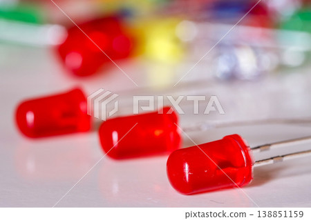 Red LED diodes close-up on white background with shallow depth of field Red LED diodes close-up on white background with shallow depth of field 138851159
