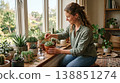 A woman carefully tending to her indoor plants. 138851274