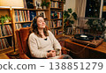 A woman relaxing while listening to her favorite records. 138851279
