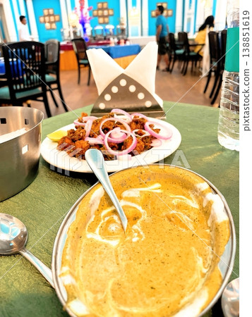 Authentic butter chicken curry and kebabs served at an Indian palace hotel. Authentic butter chicken curry and kebabs served at an Indian palace hotel. 138851619