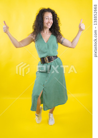 Happy woman giving double thumbs up for success Happy woman giving double thumbs up for success 138852668