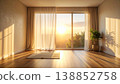 Modern minimalist living room interior with armchair, green plant, and wooden floor. Bright morning sunlight streaming through window with beige curtains, creating warm cozy home atmosphere. 138852758
