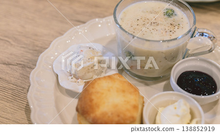 Scone and soup set, a light meal plate from a cafe. Scone and soup set, a light meal plate from a cafe. 138852919