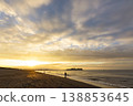 Shonan Tsujido Beach: Sunrise, Enoshima Island, and the silhouette of a fisherman. 138853645