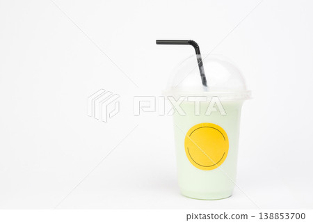 Delightful mint beverage in a stylish cup showcasing on a clean white background perfect for refreshing moments Delightful mint beverage in a stylish cup showcasing on a clean white background perfect for refreshing moments 138853700