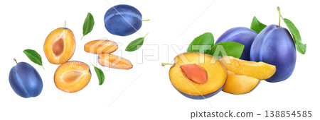 fresh blue plum and half with leaves isolated on white background. Top view. Flat lay fresh blue plum and half with leaves isolated on white background. Top view. Flat lay 138854585