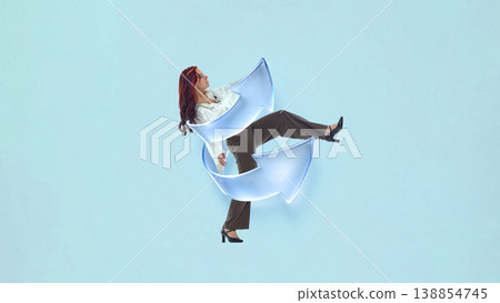 Woman wrapped in circular arrows representing process iteration and continuous workflow 138854745