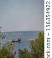 Helicopter Efforts in Fighting Forest Fire from Above 138854922