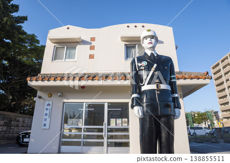 Miyakojima Mamoru-kun standing in front of the Hirara Police Box 138855511
