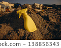 Yellow sunscreen spray bottle on dry sand beach Summer sun protection concept minimal cosmetic product mockup with copy space 138856343
