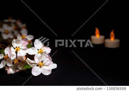 Remembering a Loved One With Flowers and Candles in Dark Tones for Reflection and Remembrance 138856509