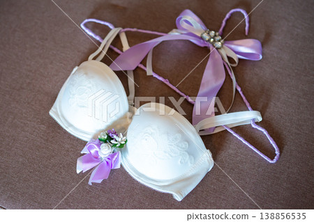 bride's linen white bra on the hanger 138856535