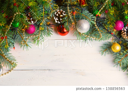 Christmas wooden background with snow branch. Top view with copy space for your text Christmas wooden background with snow branch. Top view with copy space for your text 138856563
