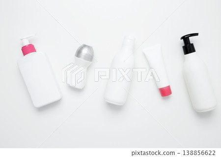 Cosmetic beauty products. Bottles and tubes with branding mock up. Skin care and beauty concept Cosmetic beauty products. Bottles and tubes with branding mock up. Skin care and beauty concept 138856622