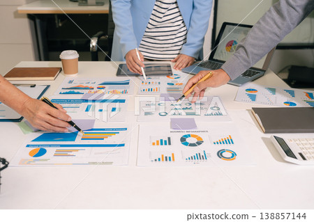 Business meeting account managers crew working search page on computer with new startup project. Idea presentation, analyze plans. Business meeting account managers crew working search page on computer with new startup project. Idea presentation, analyze plans. 138857144