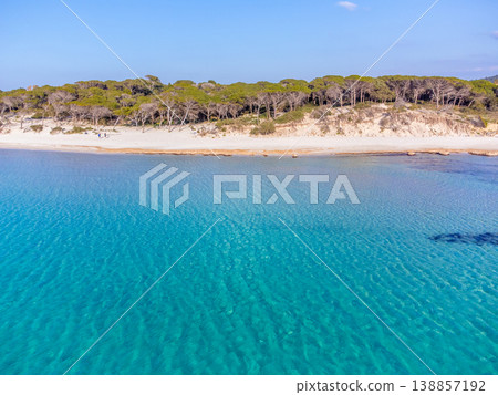 Aerial view of Maria Pia beach under a blue sky. 138857192