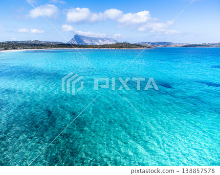 Aerial view of Lu Impostu beach clear water Aerial view of Lu Impostu beach clear water 138857578