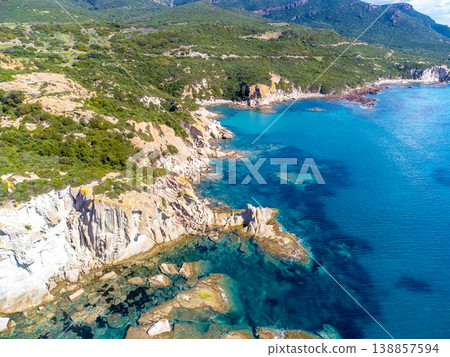 Aerial view of Cala Cumpultittu rocky shoreline in springtime 138857594