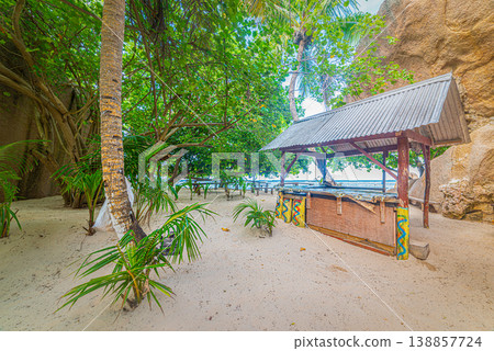 Beach bar stand in a tropical beach Beach bar stand in a tropical beach 138857724