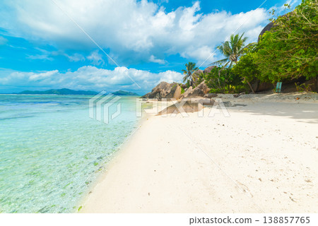 White sand and turquoise water in a tropical beach 138857765