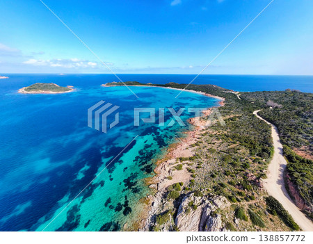 Aerial view of Capo Coda Cavallo shoreline in springtime 138857772