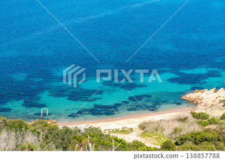 Shades of blue in Capo Coda Cavallo shoreline 138857788