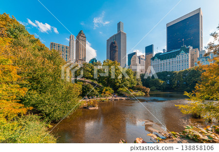 Central Park with skyscrapers on the background in fall Central Park with skyscrapers on the background in fall 138858106