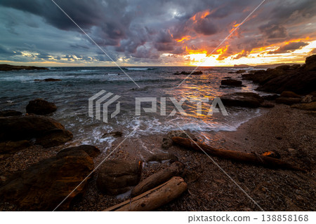 Dark sky over the sea at sunset in Sardinia Dark sky over the sea at sunset in Sardinia 138858168