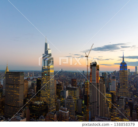 Manhattan skyscrapers seen from above at sunset Manhattan skyscrapers seen from above at sunset 138858379