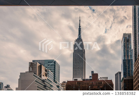 Famous skyscrapers in Manhattan under a grey sky 138858382