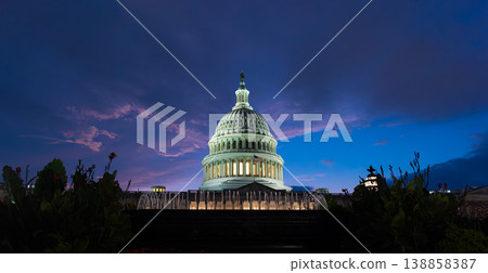 World famous United States Capitol Building under a dramatic sky at sunset World famous United States Capitol Building under a dramatic sky at sunset 138858387