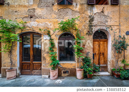 Rustic doors in a small village in Tuscany Rustic doors in a small village in Tuscany 138858512