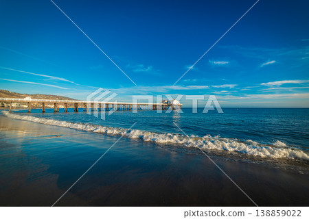 Malibu Pier seen from Surfrider Beach at sunset Malibu Pier seen from Surfrider Beach at sunset 138859022