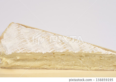 Brie Cheese Wedge on Wood Brie Cheese Wedge on Wood 138859195