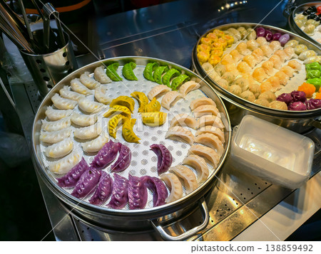 Vibrant Array of Colorful Dumplings at an Asian Night Food Street Market in China 138859492