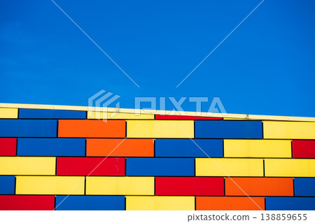 Minimalistic architectural background with strong horizontal lines, bright colors, and copy space. Concept of modern design, creativity, and urban aesthetics. Minimalistic architectural background with strong horizontal lines, bright colors, and copy space. Concept of modern design, creativity, and urban aesthetics. 138859655