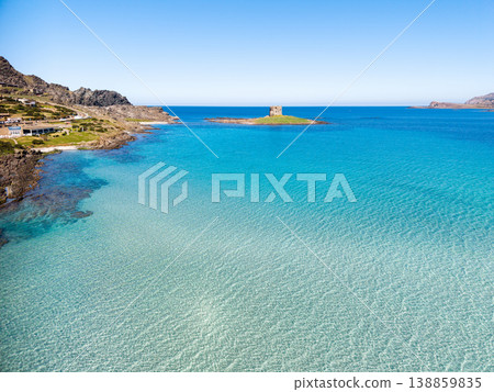 Aerial view of La Pelosa beach turquoise water on a sunny day Aerial view of La Pelosa beach turquoise water on a sunny day 138859835