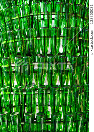 Vertical shot of Background of empty green glass bottles. Vertical shot of Background of empty green glass bottles. 138860021