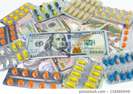 Money and pills: a symbol of the rising cost of medicines in the world and in Ukraine. 2018 Money and pills: a symbol of the rising cost of medicines in the world and in Ukraine. 2018 138860049