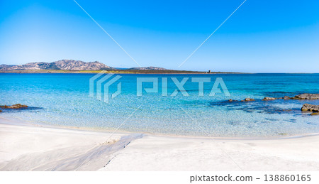 White sand beach with turquoise water and rocks White sand beach with turquoise water and rocks 138860165