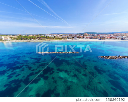Aerial view of Lido San Giovanni in Alghero seen from the water 138860192