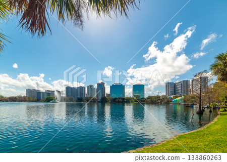 Sun shining over beautiful Lake Eola park in Orlando Sun shining over beautiful Lake Eola park in Orlando 138860263