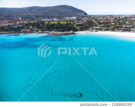 Aerial view of La Pelosa beach seen from the water on a sunny day Aerial view of La Pelosa beach seen from the water on a sunny day 138860299