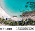 Top down view of La Pelosa beach with white sand rocks and turquoise water 138860320
