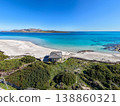 Aerial view of a wooden hut in La Pelosa beach shoreline 138860321