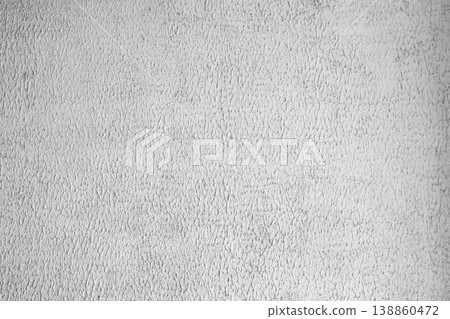 Grey textured concrete wall background with rough plaster surface and fine grain. Grey textured concrete wall background with rough plaster surface and fine grain. 138860472