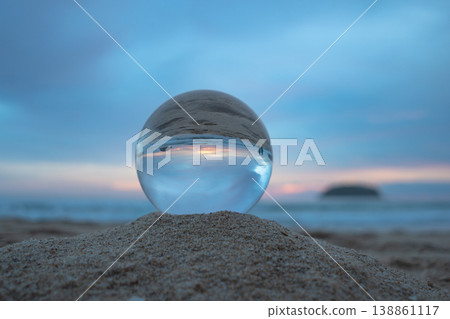 sweet blue sky in sunset above the island in crystal ball. sweet blue sky in sunset above the island in crystal ball. 138861117